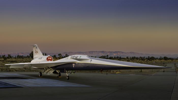 NASA’s X-59 quiet supersonic research aircraft sits on the apron outside Lockheed Martin’s Skunk Works facility at dawn in Palmdale, California. 