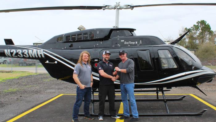 Lasen takes delivery of Bell 206 from Meridian Helicopters