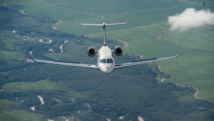 Embrear Praetor super midsize business jet in flight