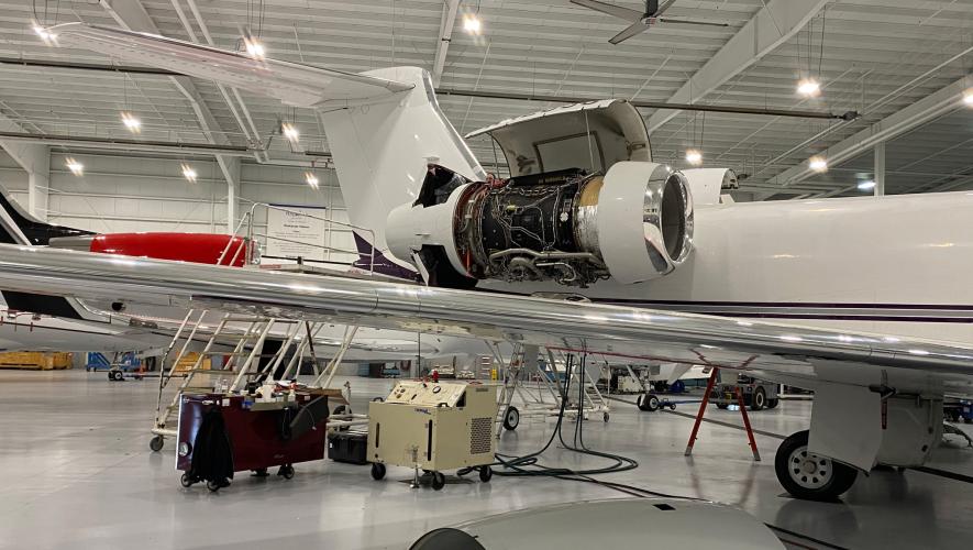 engine work being done on business jet
