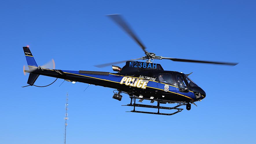 Baltimore Police Department’s Airbus H125 in flight near cellular tower