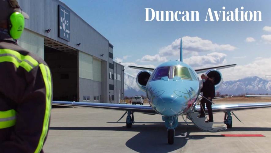 man boarding private jet at Duncan Aviation