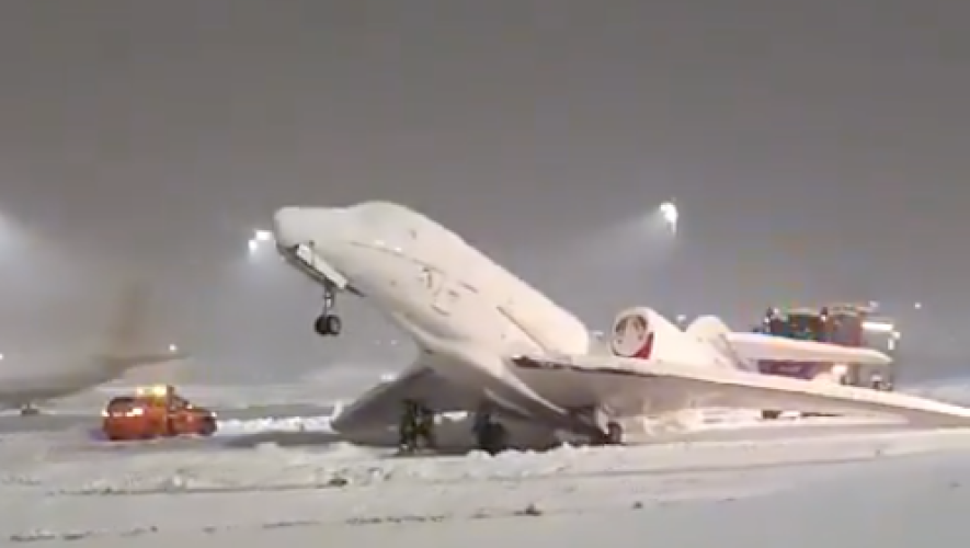 Cessna Citation aircraft trapped in snow at Munich International Airport