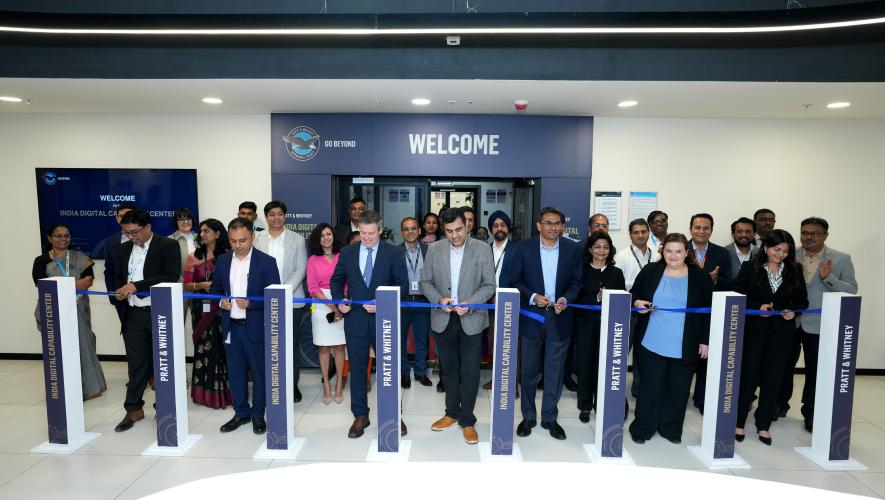 Pratt & Whitney leaders participate in a ribbon-cutting ceremony during the inauguration of the India Digital Capability Center in Bengaluru.