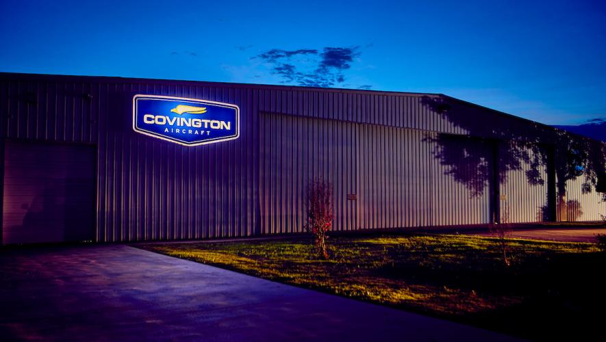 Image of Covington Aircraft facility at night