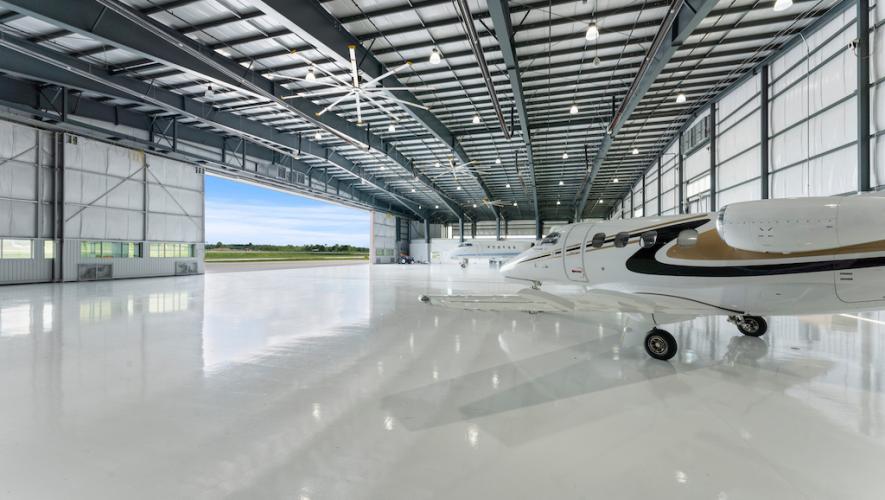 Chartright's hangar at Lake Simcoe Regional Airport with business jet parked inside