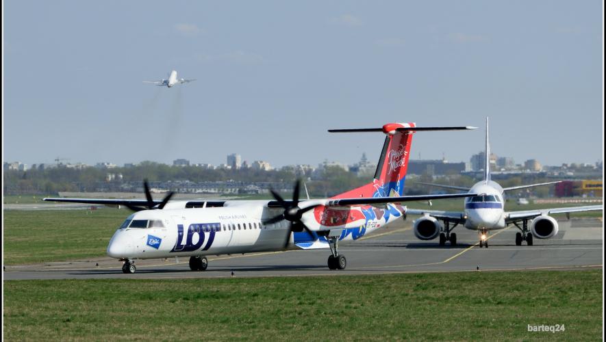 Polish Lot aircraft on airport taxiway