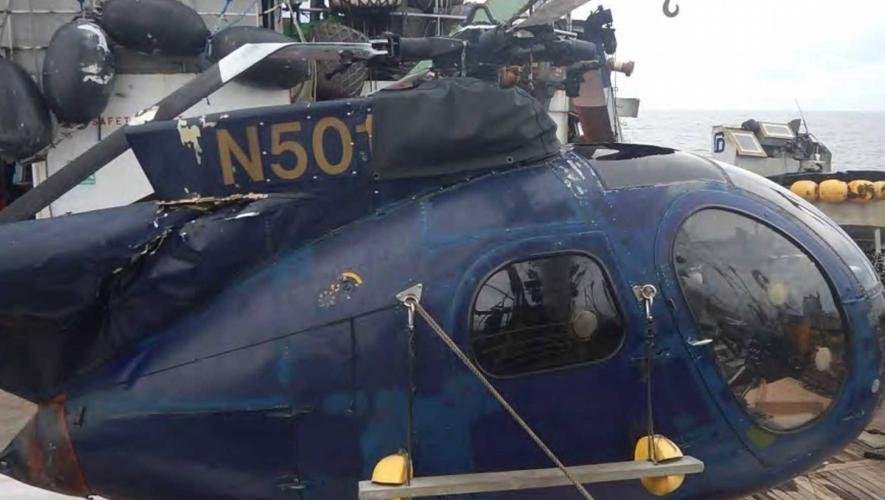 Crashed Hansen helicopter on tuna boat deck 