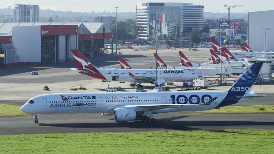 Qantas Airbus A350-1000 on taxiway near Qantas hangar facilities while on demonstration tour