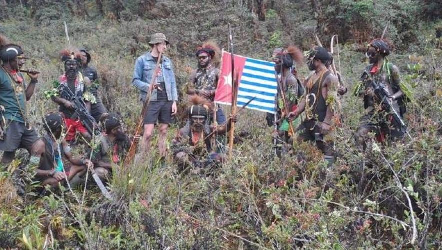  Susi Air pilot Philip Mehrtens stands amongst Papua rebels who kidnapped him