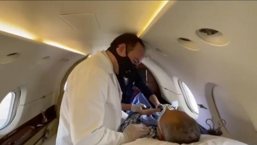 Patient and medical professionals onboard medically equipped jet