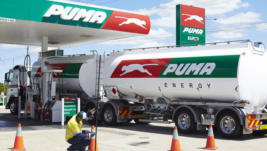 Puma Energy fuel truck refilling tanks at fuel station in Brisbane