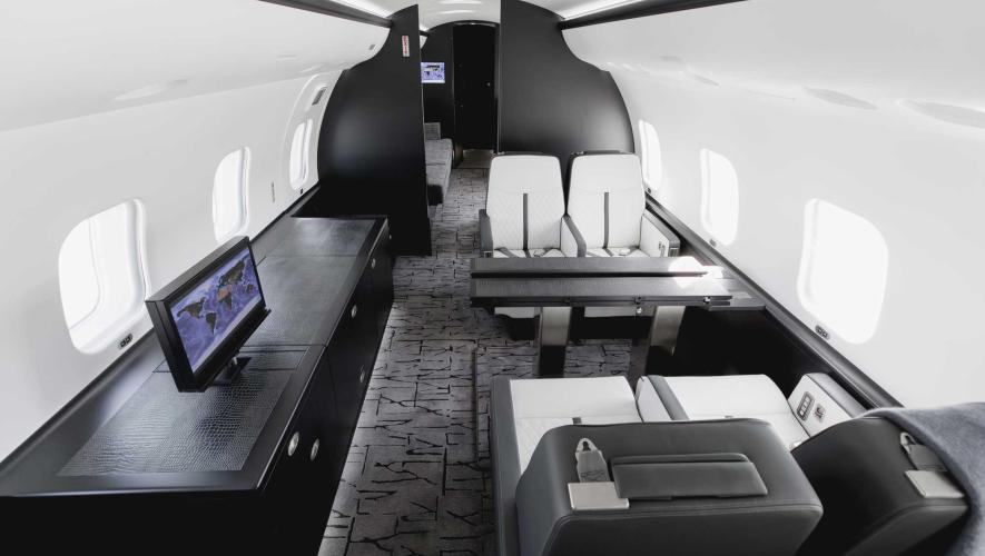 Cabin of fully-customized Bombardier Global Express featuring a a "clean, bright, minimalist color palette."