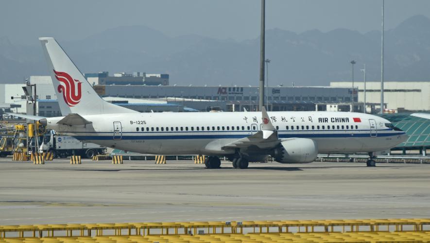 An Air China 737 Max 8 sits parked at Beijing Capital International Airport on March 11, 2019, the day after Chinese authorities grounded the model. 