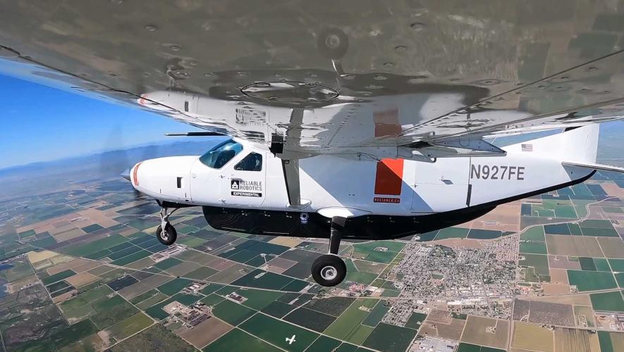 A Reliable Robotics Cessna 208 Caravan is pictured in flight.