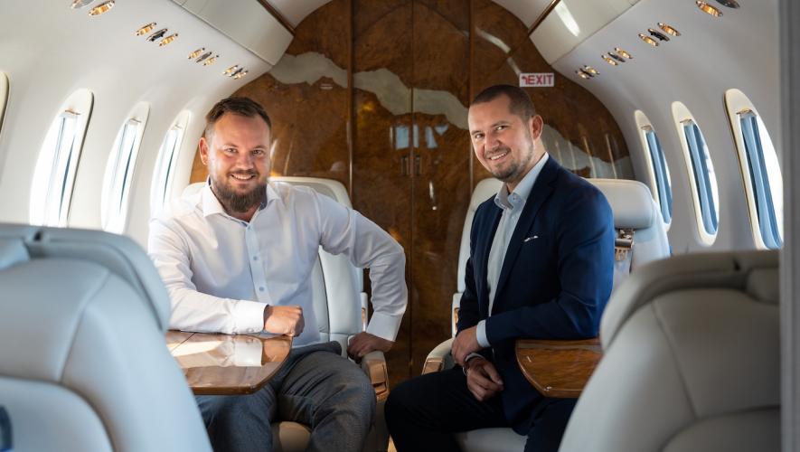 Gemini Wings founders Peter Duchovny (left) and Martin Feč in cabin of business jet