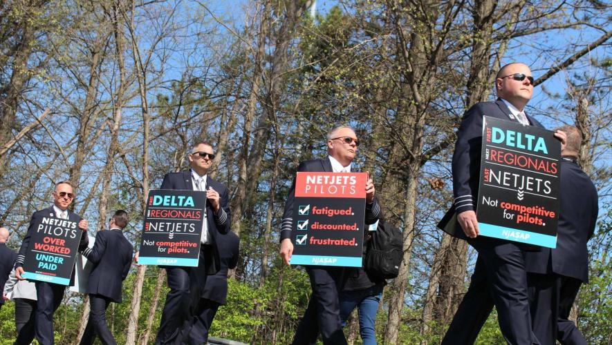 NetJets Association of Shared Aircraft Pilots hold a picket across from company headquarters in Columbus, Ohio, on April 19, 2023