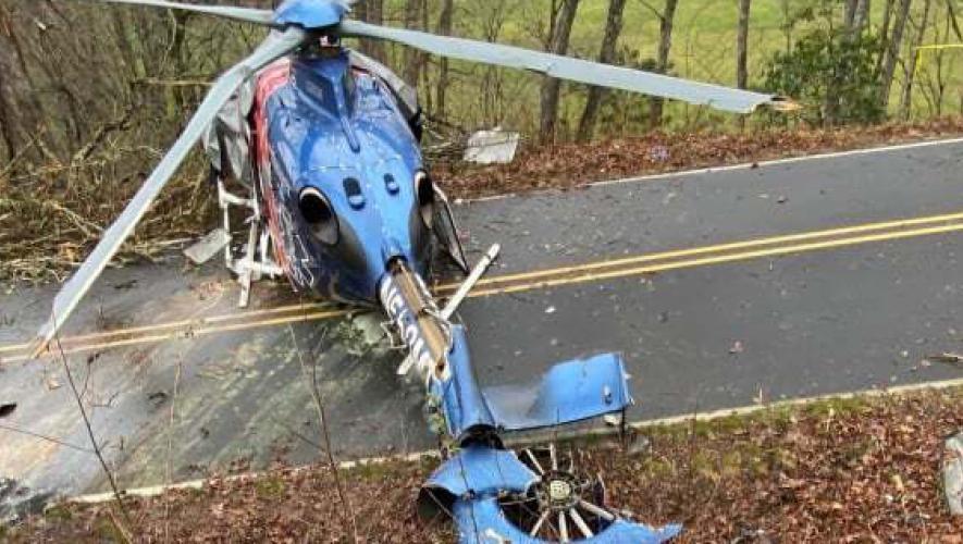 Crashed medevac helicopter resting on North Carolina roadway