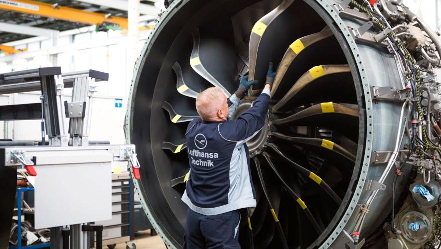  Lufthansa Technik technician working on Leap 1A engine