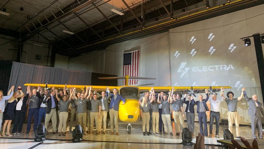 Electra employees in hangar with its eSTOL technology demonstrator aircraft.