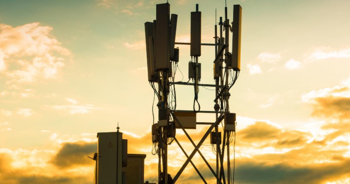 5G cellphone tower at sunset