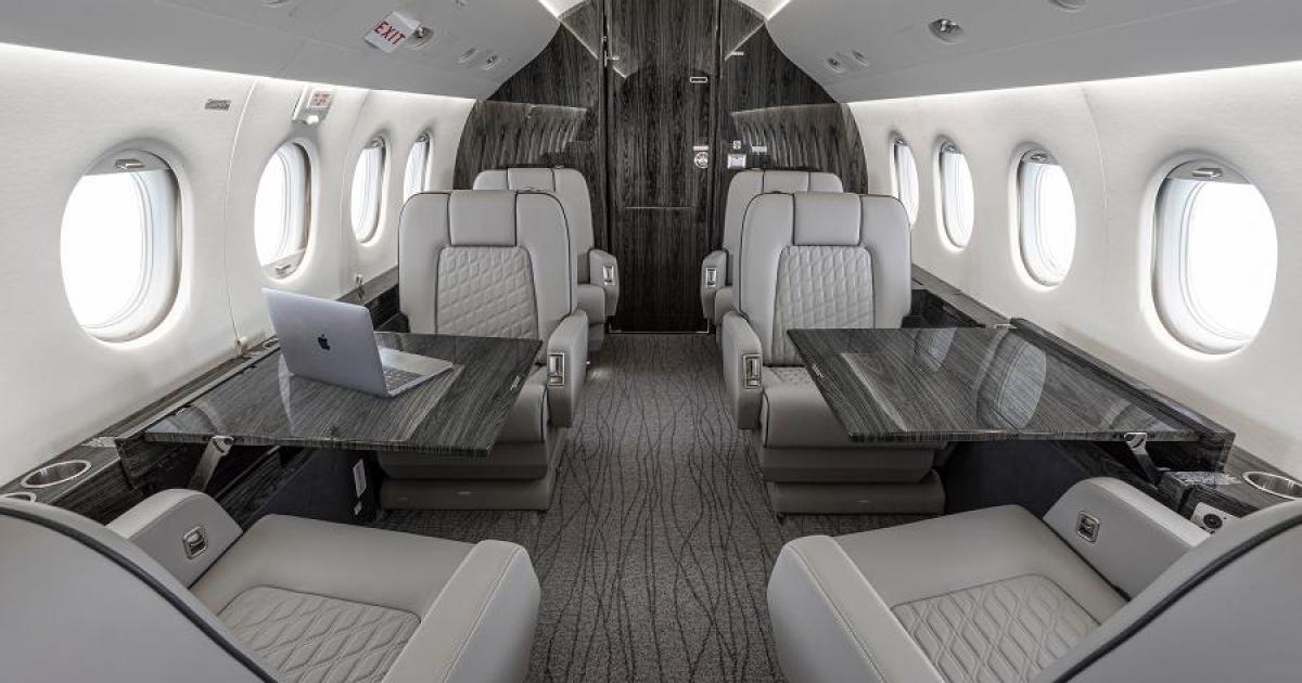 Falcon 2000 interior cabin featuring cabinets with hydrographic finishes