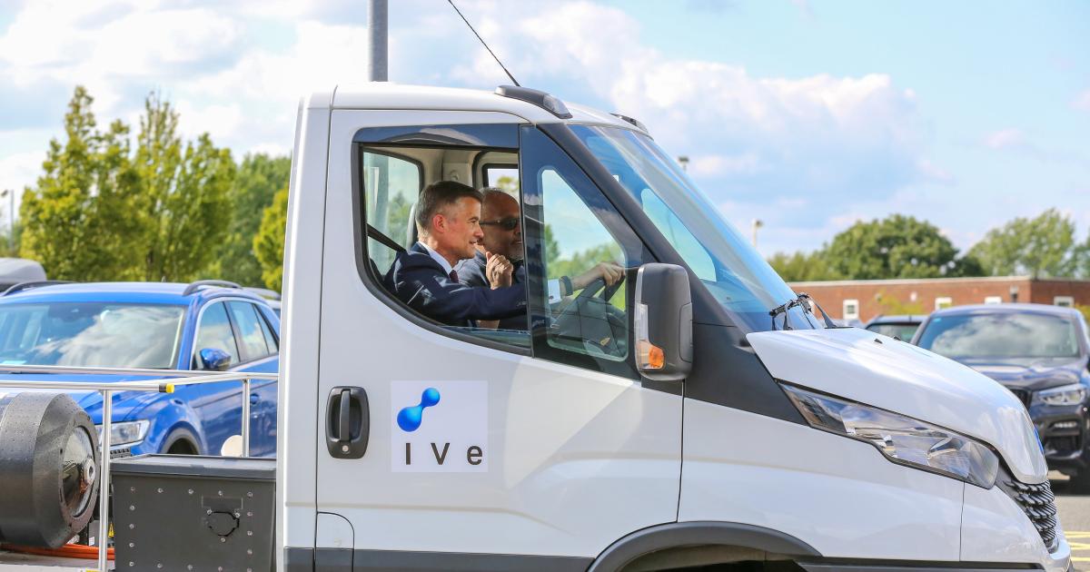 UK transport secretary Mark Harper drives a hydrogen ground vehicle at Teesside Airport. 