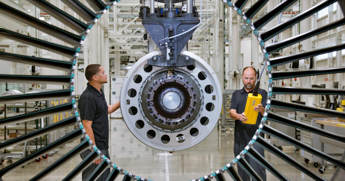 Pratt & Whitney mechanics inspect PW1100G