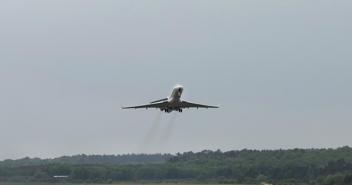business jet taking off