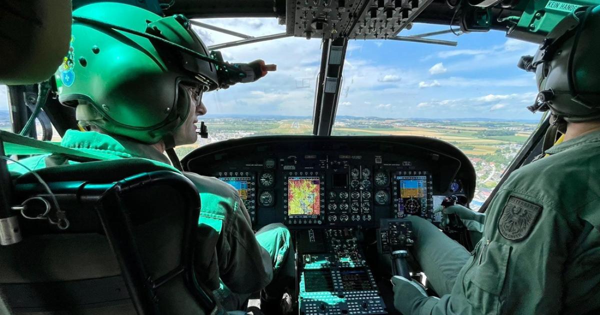 pilots in Bell 212 testing Universal Avionic's i-FMS system