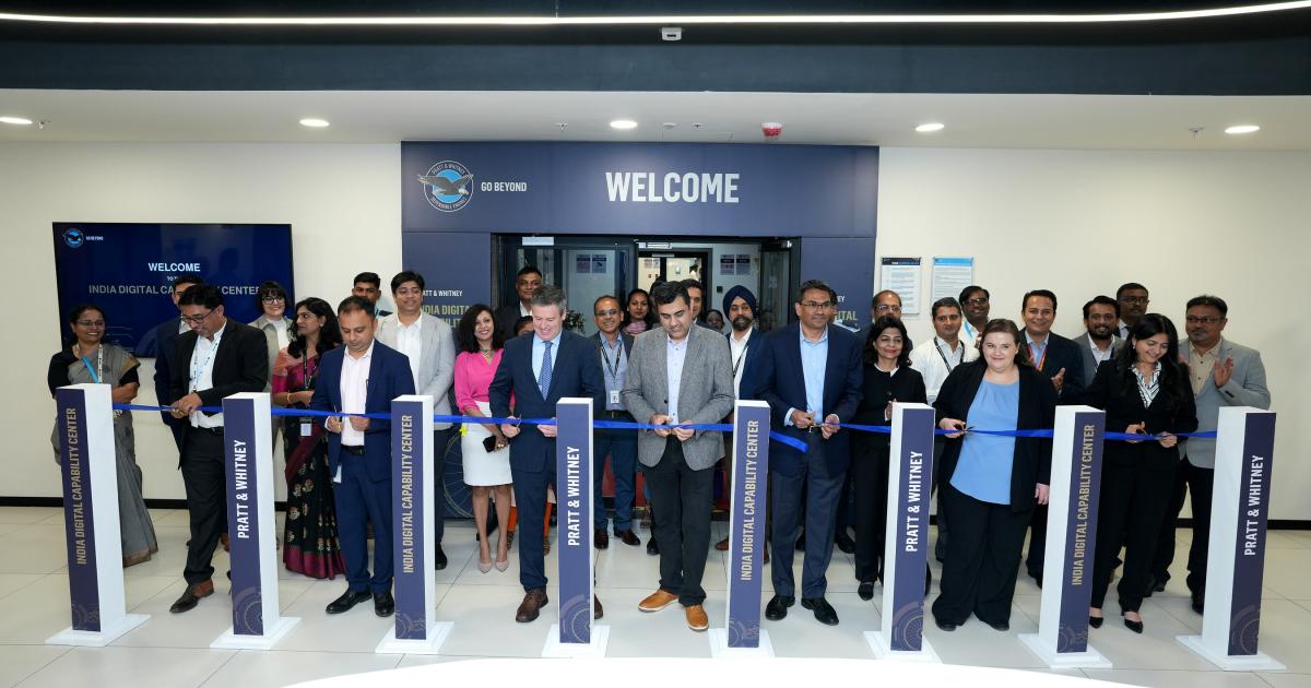 Pratt & Whitney leaders participate in a ribbon-cutting ceremony during the inauguration of the India Digital Capability Center in Bengaluru.