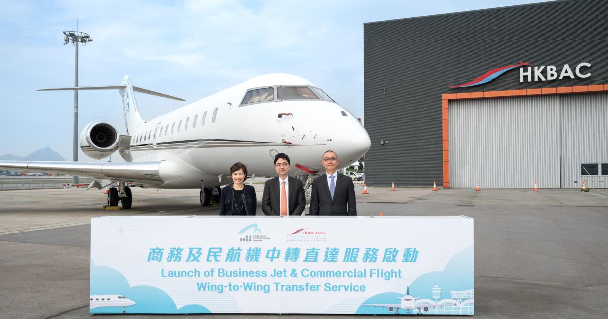Officials at Hong Kong International Airport at launch of Jet transfer service