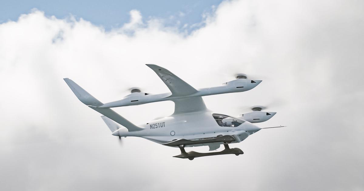 Beta Technologies' Alia 250 eVTOL flies across a partly cloudy sky