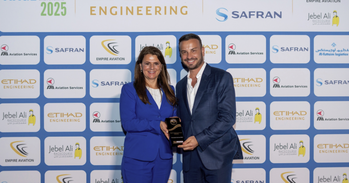 FAI's Barbara Baumgartner and Michael Axtmann with the award