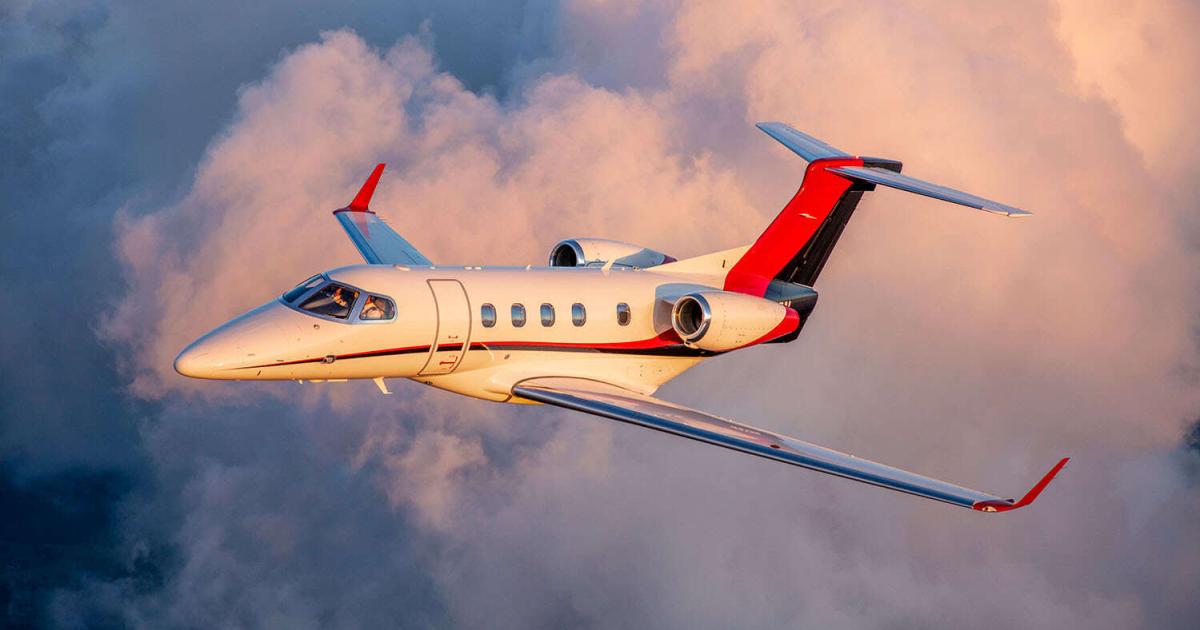 Phenom 300 flying through clouds