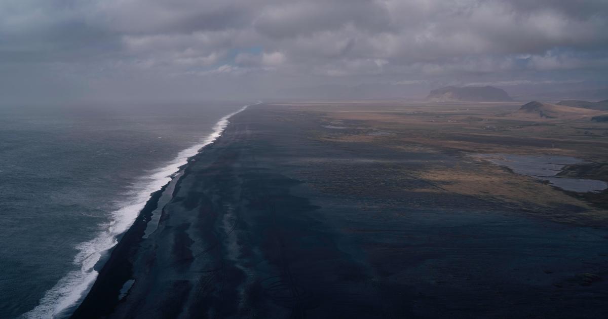 aerial image of ocean waves near land