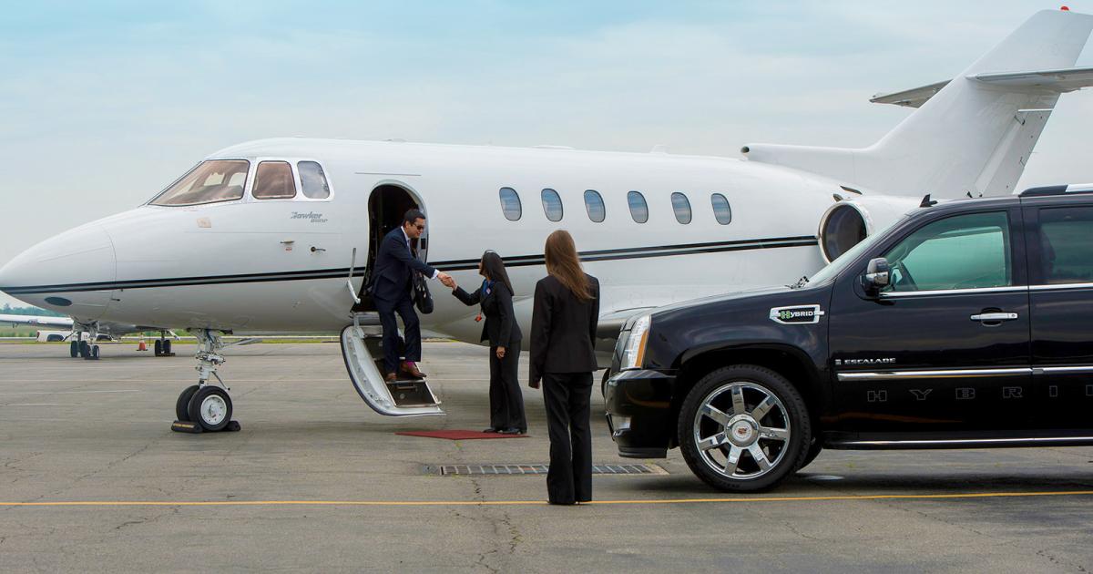 car service picking up private jet passenger on ramp