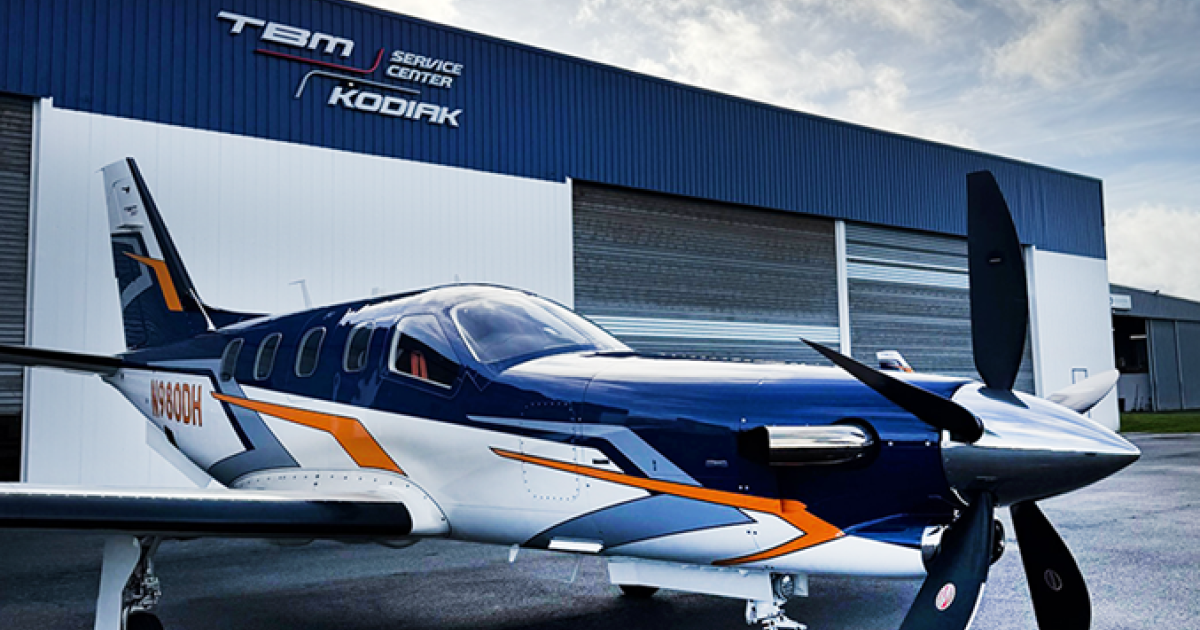 Daher TBM 980 on ramp outside hangar 