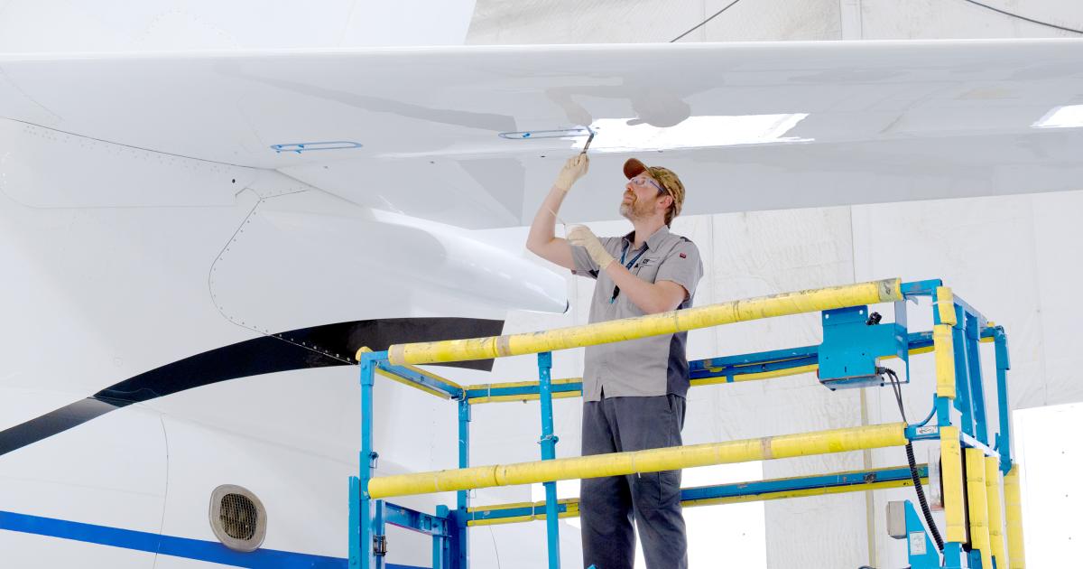 Duncan Aviation technician working on Dassault 8X