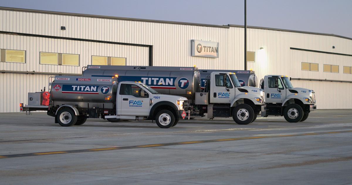 Titan branded fuel trucks on ramp