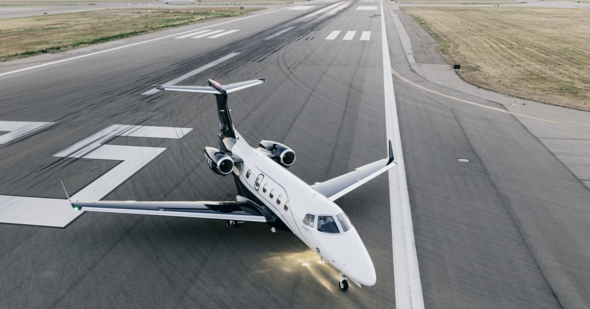 Phenom 300 on a runway
