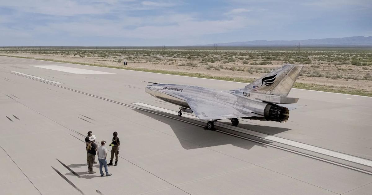 Ground crew prepare the Quarterhorse Mk 2.1 on the runway at Spaceport America ahead of a test flight.