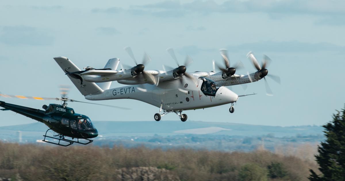 Vertical VX4 flying with chase helicopter 