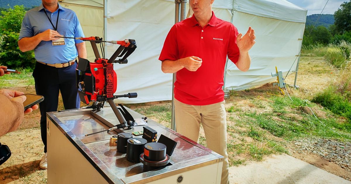 Drone on a table while representative explains 