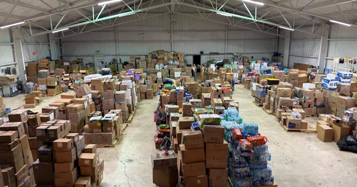 W Aviation hangar filled with relief supplies for Venezuela