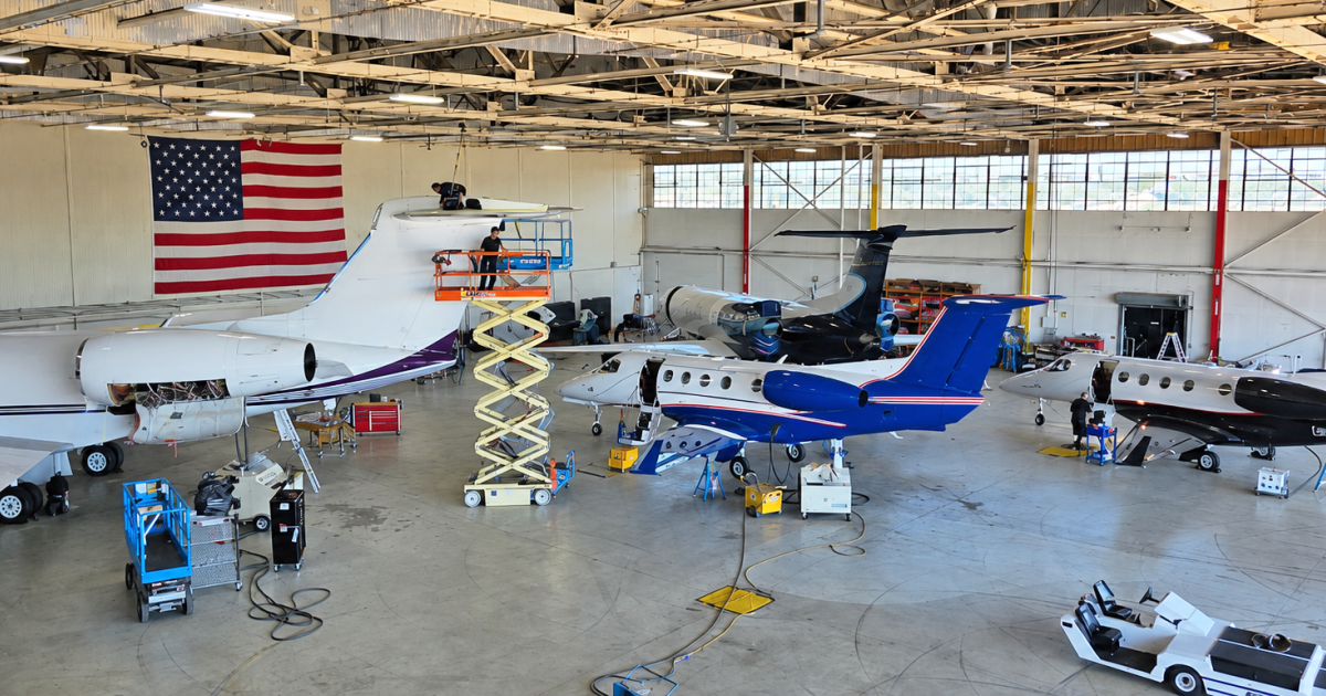 Aircraft undergoing maintenance in Altus hangar