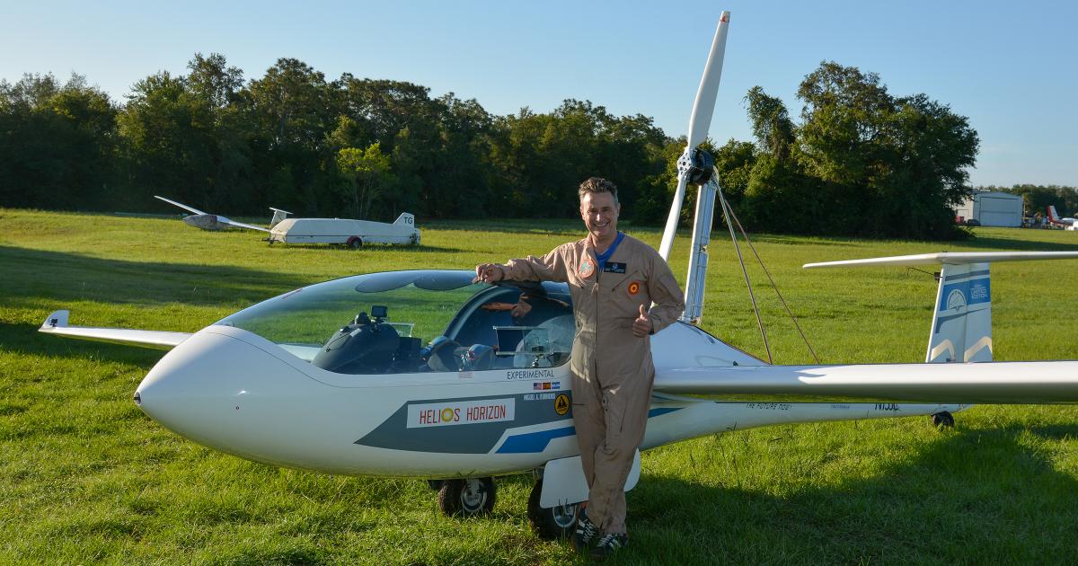 Helios Horizon founder and chief test pilot Miguel Iturmendi stands with his modified Pipistrel Taurus