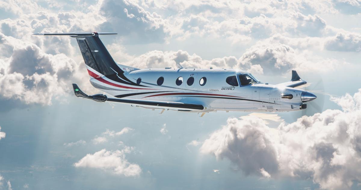 A Beechcraft Denali in flight above clouds