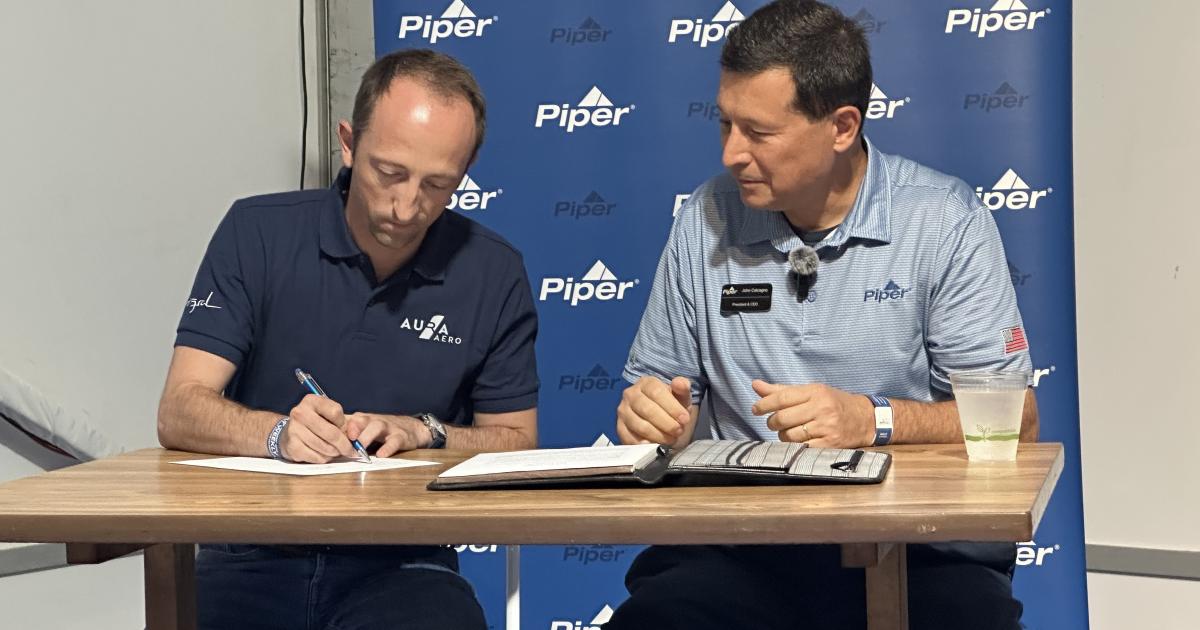 Aura CEO Jeremy Caussade and Piper Aircraft president and CEO John Calcagno