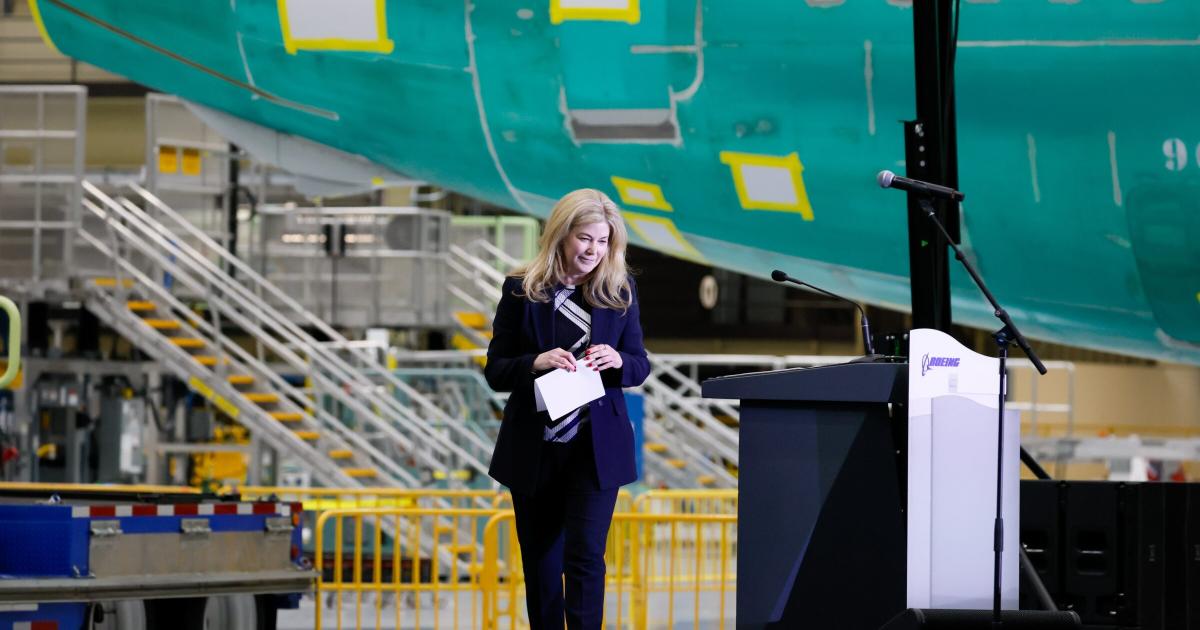Stephanie Pope, president and CEO of Boeing Commercial Airplanes, walks off stage at the ceremonial opening of Everett's North Line on July 10.